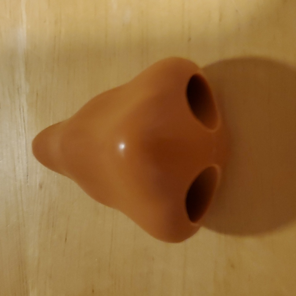 Archie McPhee Brown Nose Finger Puppet